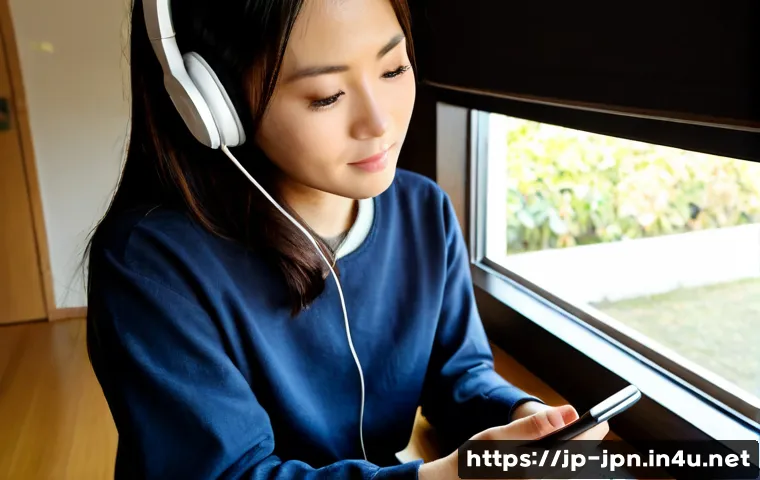 JLPT 청해 공부 효율적으로 하는 법 - Photorealistic Japanese adult learner wearing casual modest clothing and headphones, seated at a tid...